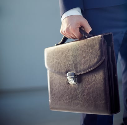 close-up-businessman-holding-briefcase-1